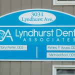 Sign displaying the dental practice name