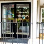 Glass entrance door of the dental office